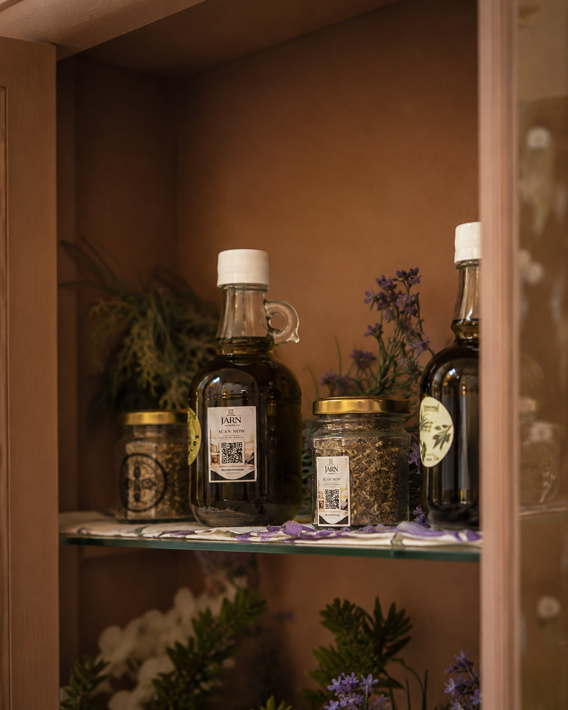 JARN olive-oil bottles with QR-code labels and small jars