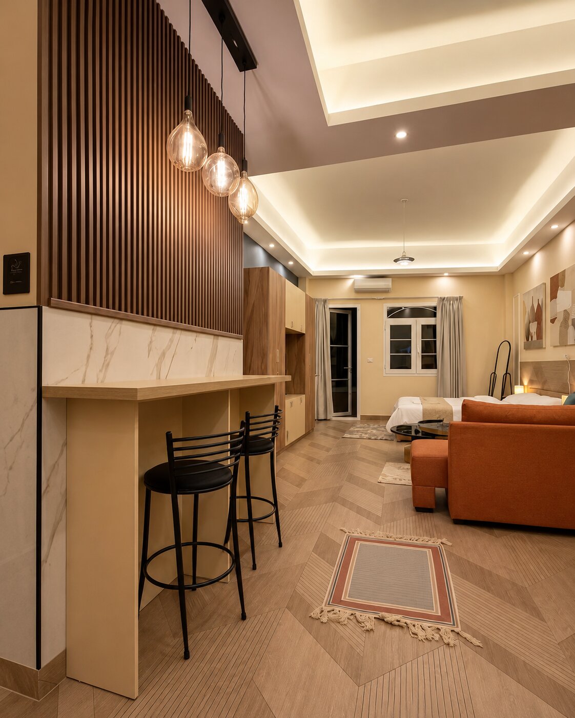 Breakfast bar with pendant lights and wood-slat feature wall