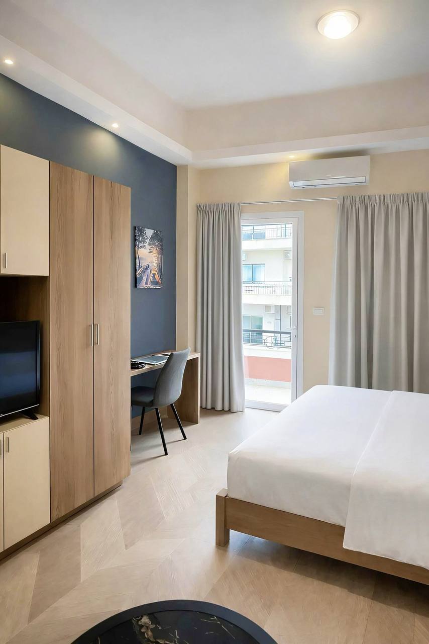 Bedroom with balcony view